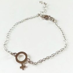 Detail of woman symbol bracelet in silver