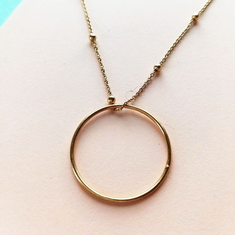 Collar Circulo de la vida y bolitas de oro