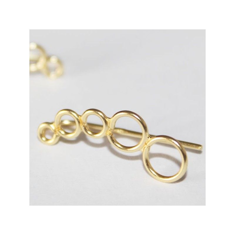 Trendy gold ear climber with a 5-circle design.