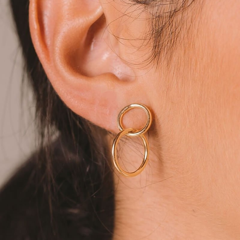 Gold karma earrings for woman