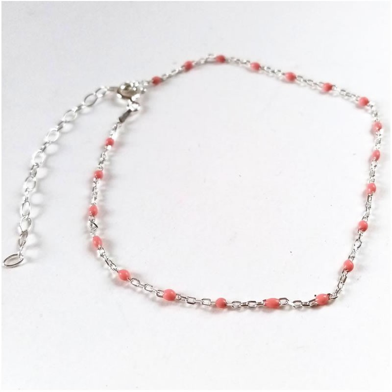 Sterling silver anklet with pink beads on ankle