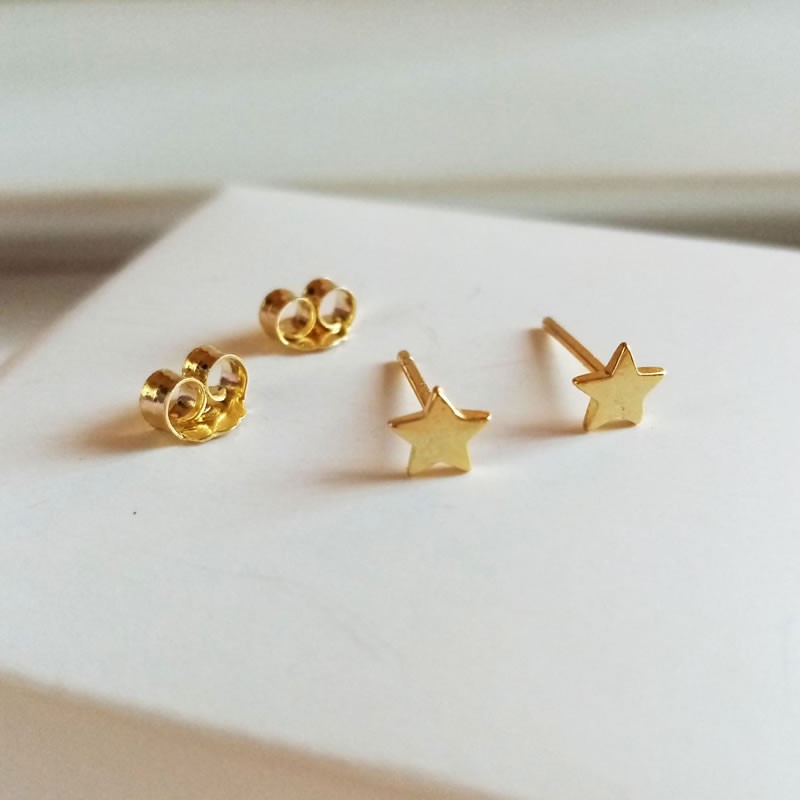 Pendientes estrella oro