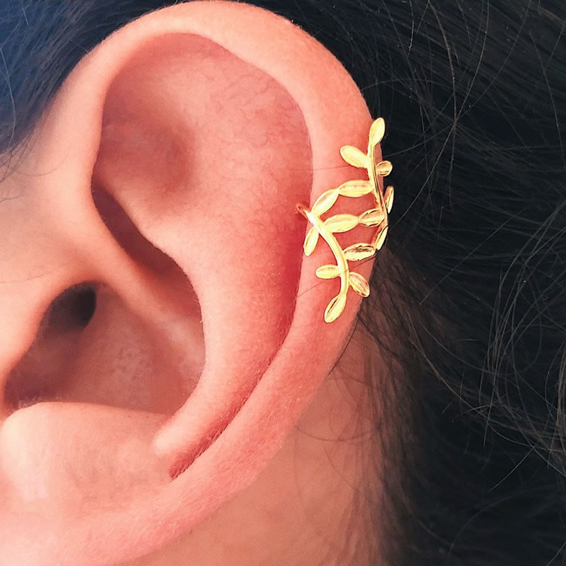 Elegant gold-plated ear cuff with nature-inspired design.