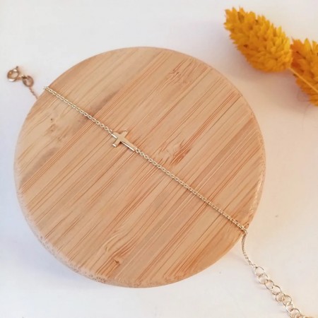 Pulsera Cruz Tumbada Oro