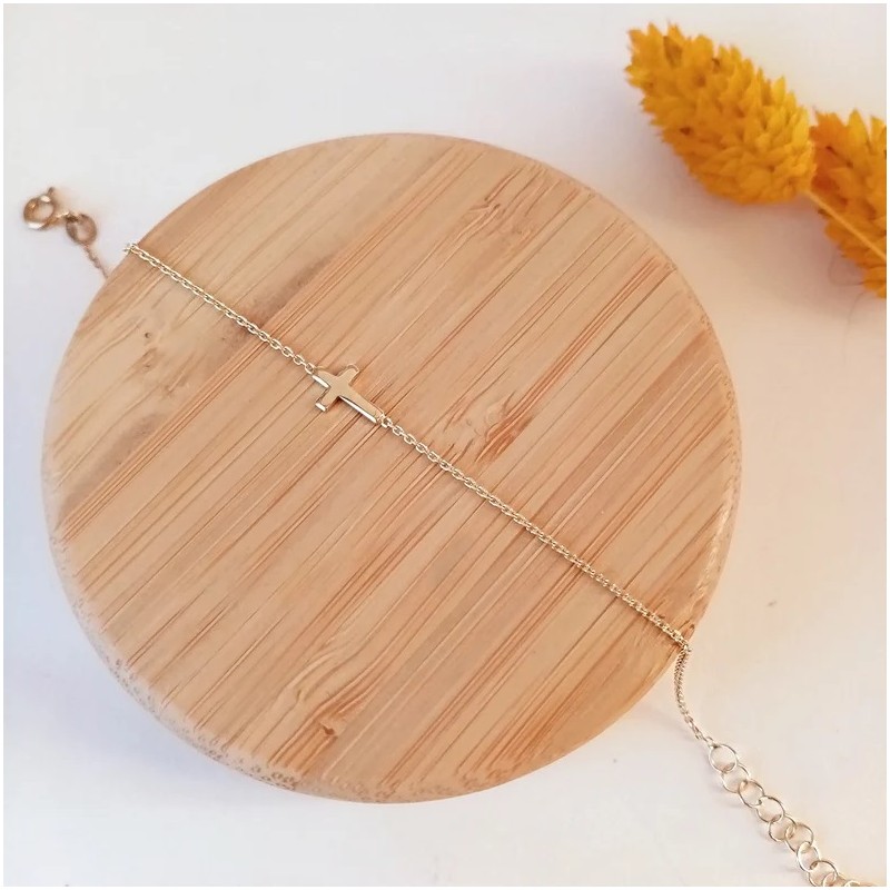 Pulsera Cruz Tumbada Oro
