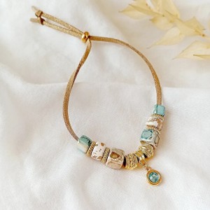 pulsera cuero dorado y turquesa