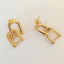 shiny gold finish on the horseshoe earrings