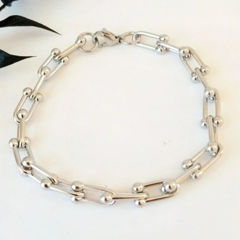 Pulsera de acero con eslabones en forma de herradura, estilo moderno y elegante