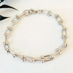 Pulsera de acero con eslabones en forma de herradura, estilo moderno y elegante