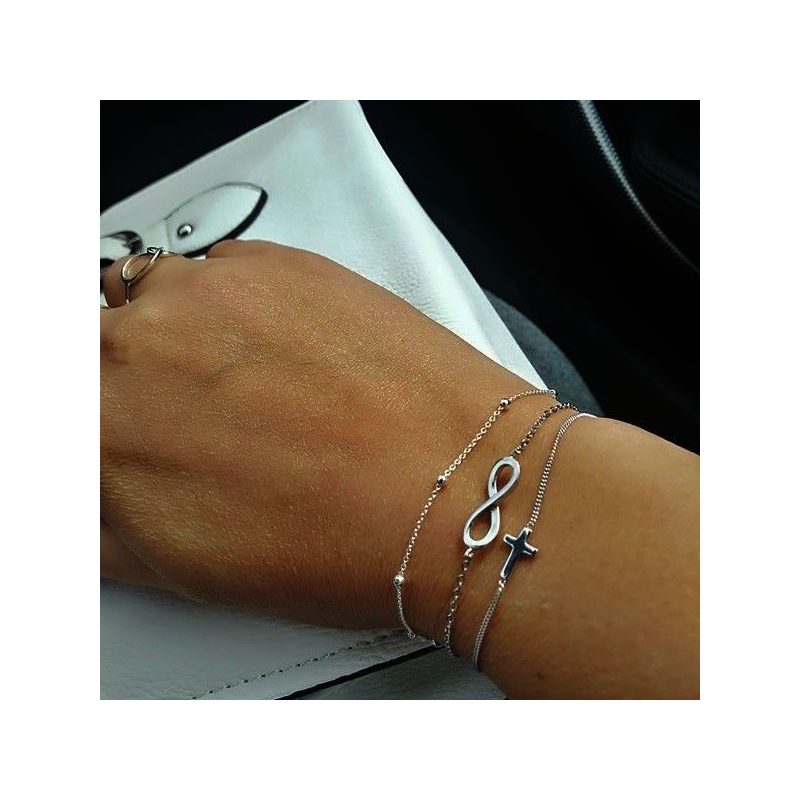 Pulsera Cruz en plata de ley de www.puravidapulseras.com